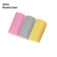Set of 3 DustPro™ PVA sponges in mixed colors (pink, gray, yellow), versatile and fun.