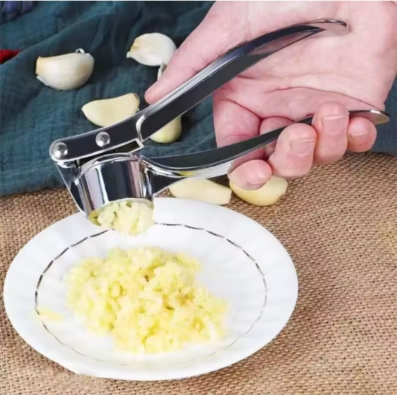 Manual zinc alloy garlic press for kitchen use