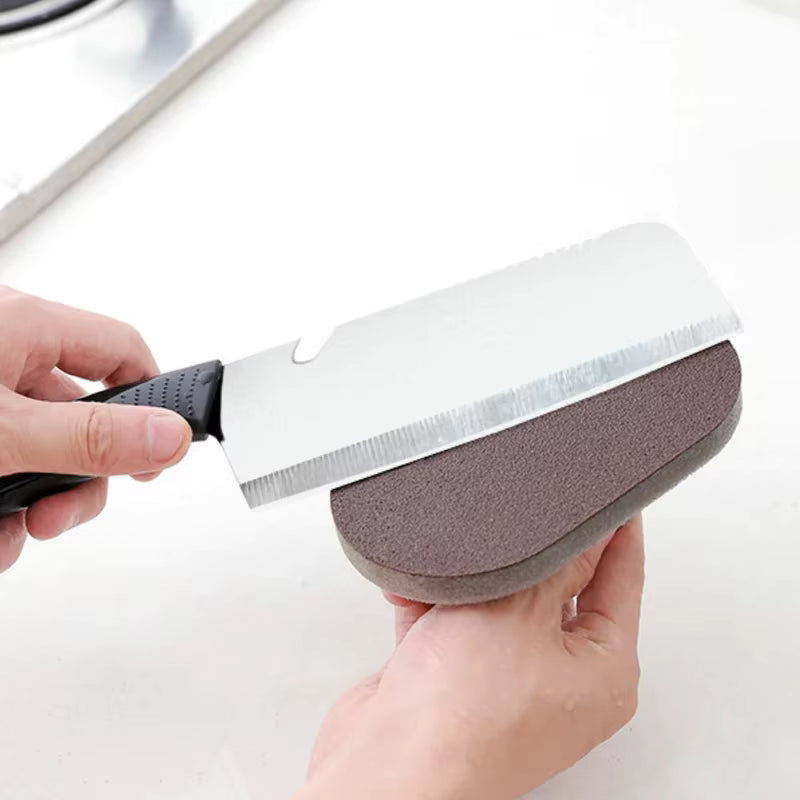 RustAway™ emery sponge brush used to clean knife blade