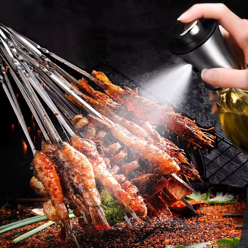 SprayChef™ fine mist oil dispenser in use on BBQ grill, ensuring even oil distribution for grilling perfection