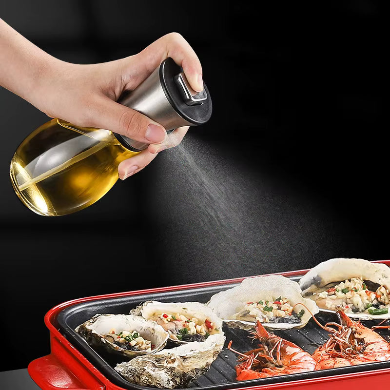 SprayChef™ fine mist oil sprayer applying mist over plancha for grilling