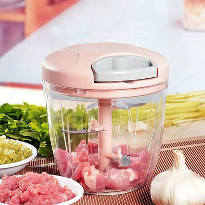 ChopEase™ pink manual chopper used to mince meat, showing versatility beyond vegetables