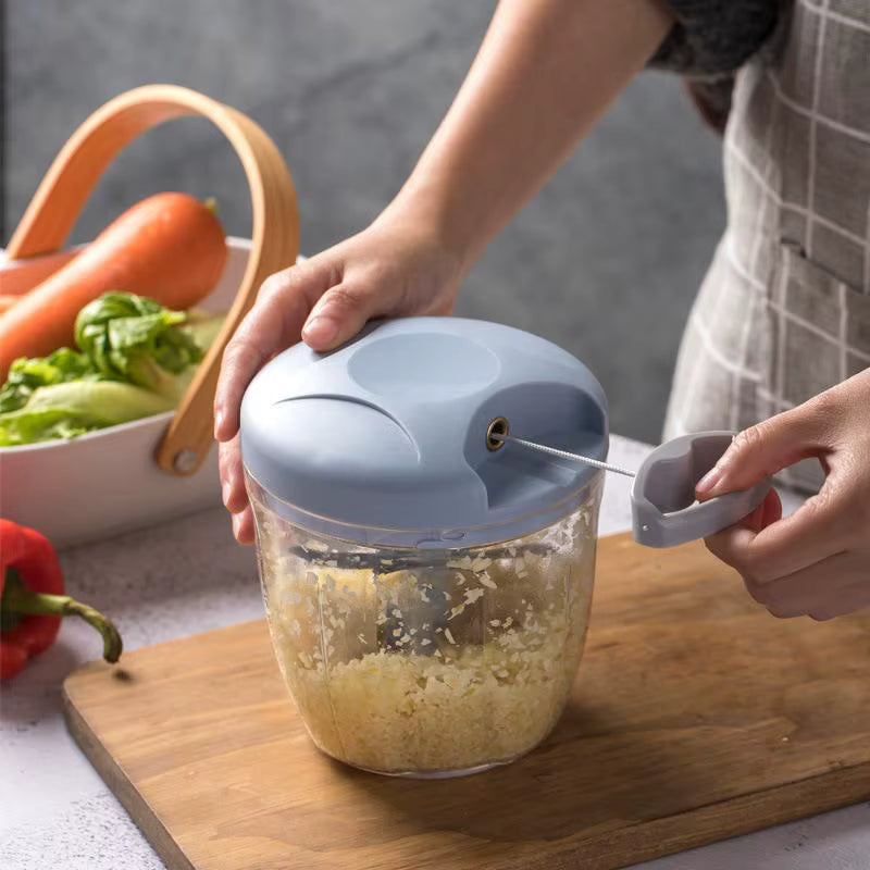 User effortlessly chopping vegetables with the ChopEase™ manual chopper for fast and efficient cooking