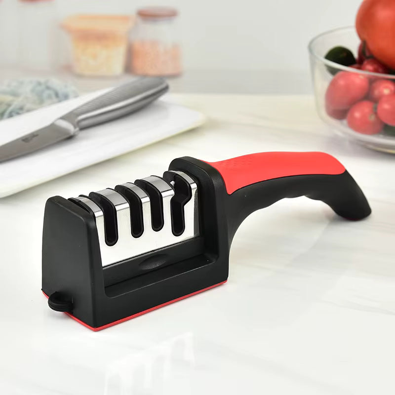 Front view of the SharpEdge™ 3-in-1 kitchen knife sharpener showing ergonomic handle and sharpening slots