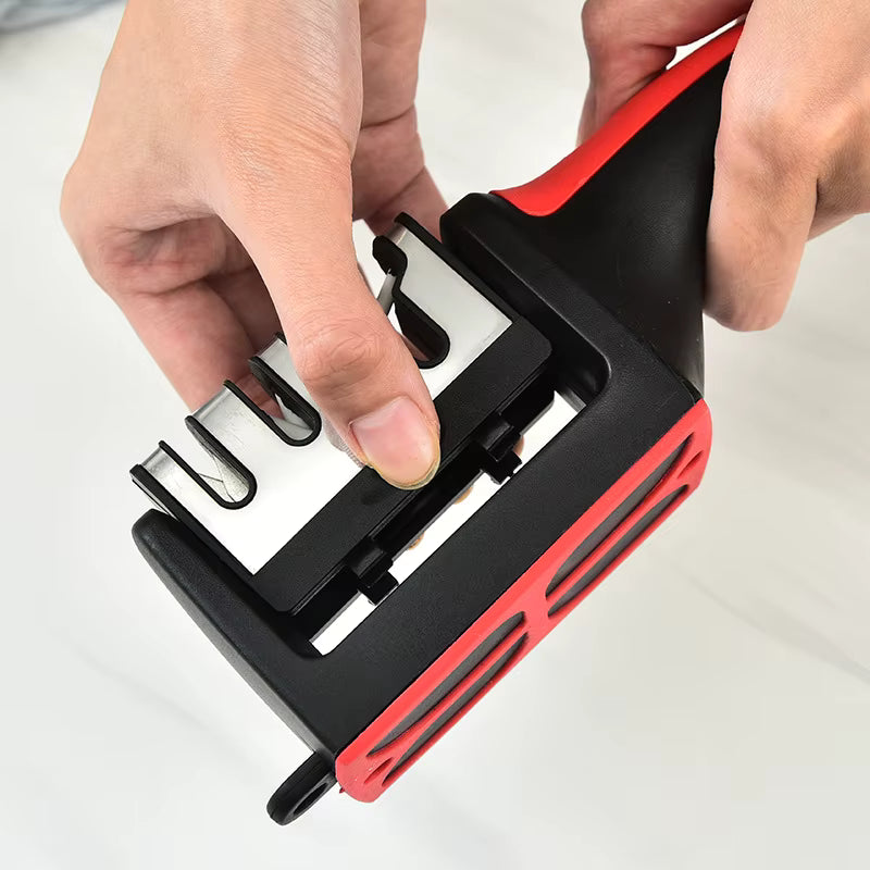 SharpEdge™ 3-in-1 knife sharpener with the top sharpening module being detached, revealing internal sharpening blades