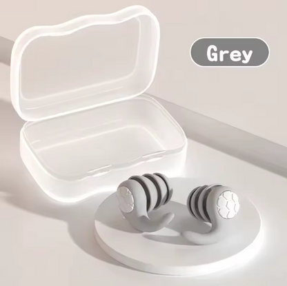 SoftSeal™ noise-blocking earplugs in grey color, perfect for discreet, comfortable use
