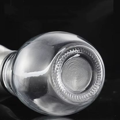 Bottom view of SprayChef™ oil dispenser showing product base